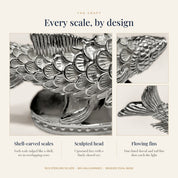 Close-up of the shell-carved scales, head and fins of the silver Matsya