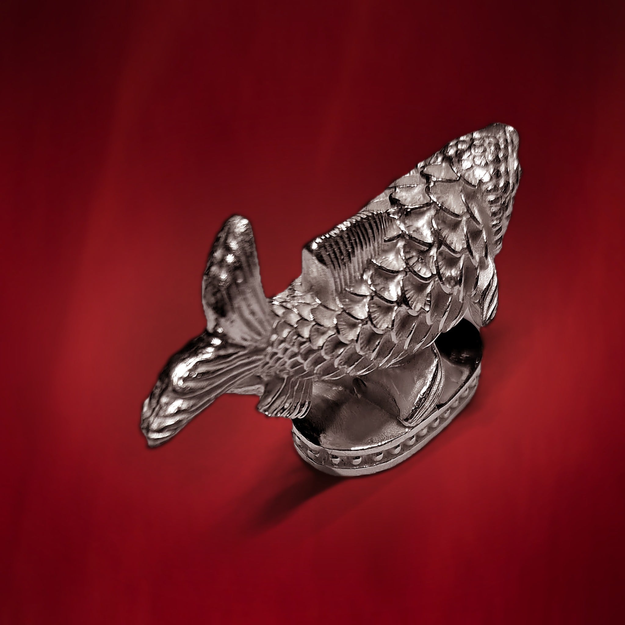 Silver Matsya fish idol three-quarter view
