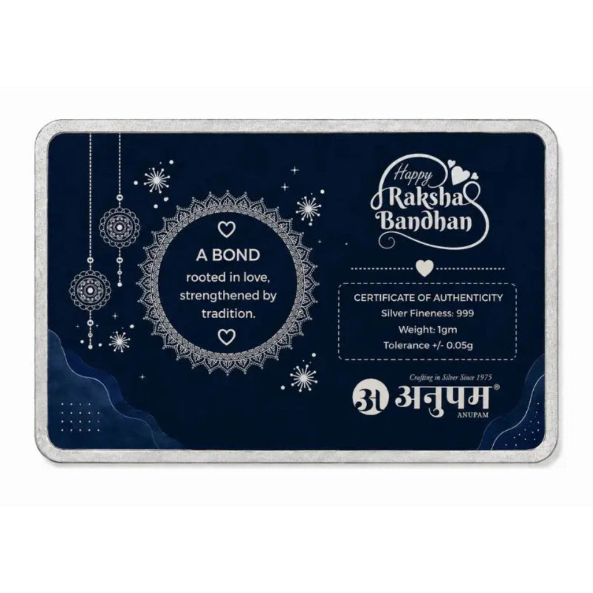 A rectangular silver-colored metal box for a silver jewelry box set, featuring a dark navy blue front with white decorative text, snowflake designs, and the brand logo 'Anupam'.