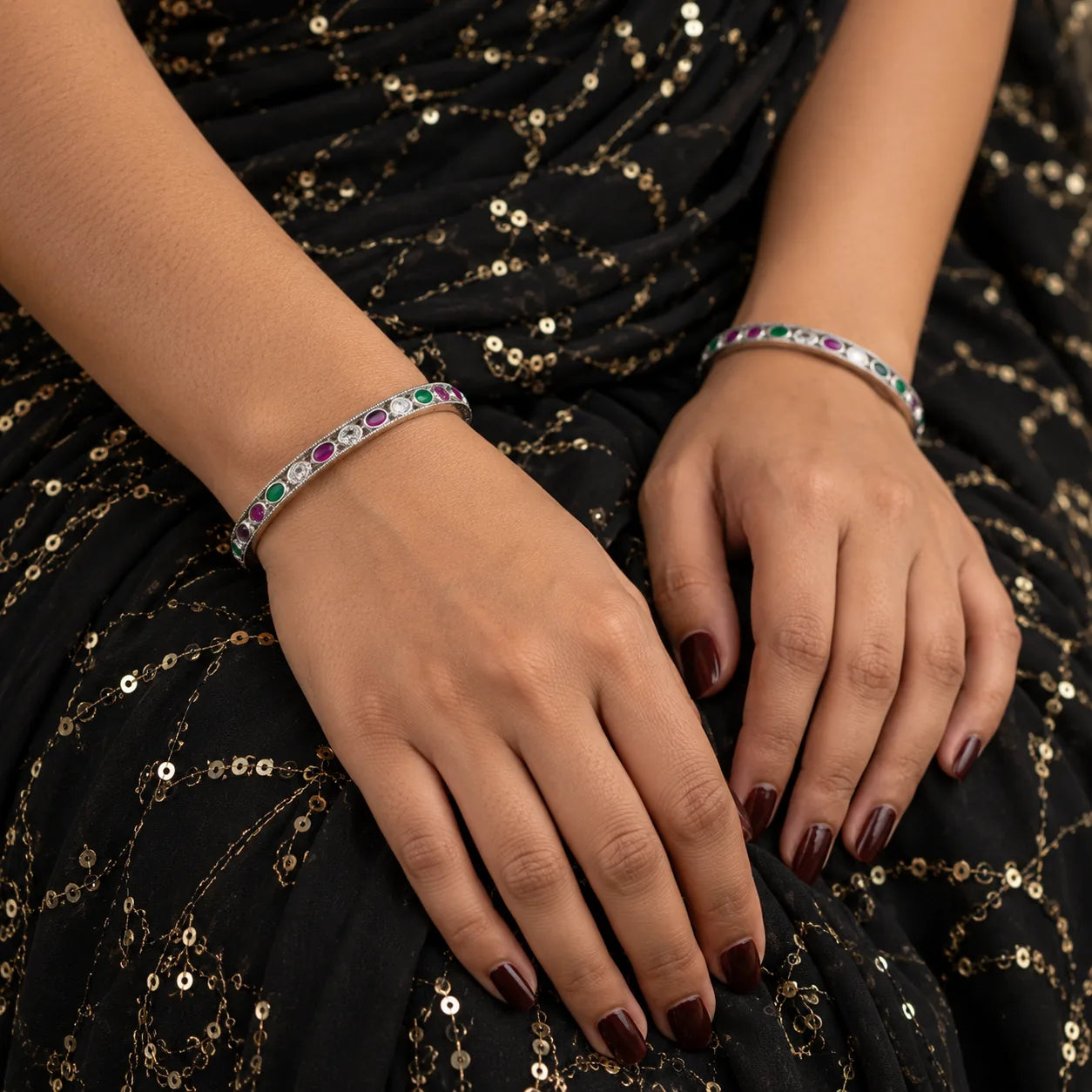 Classic oval silver bangles worn on the wrist