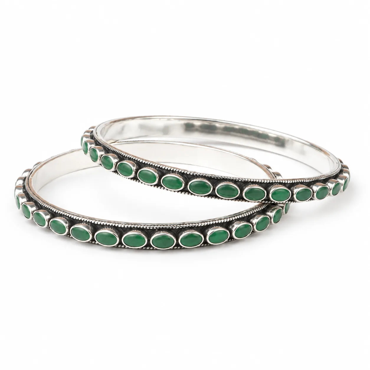 Classic oval silver bangles with green stones
