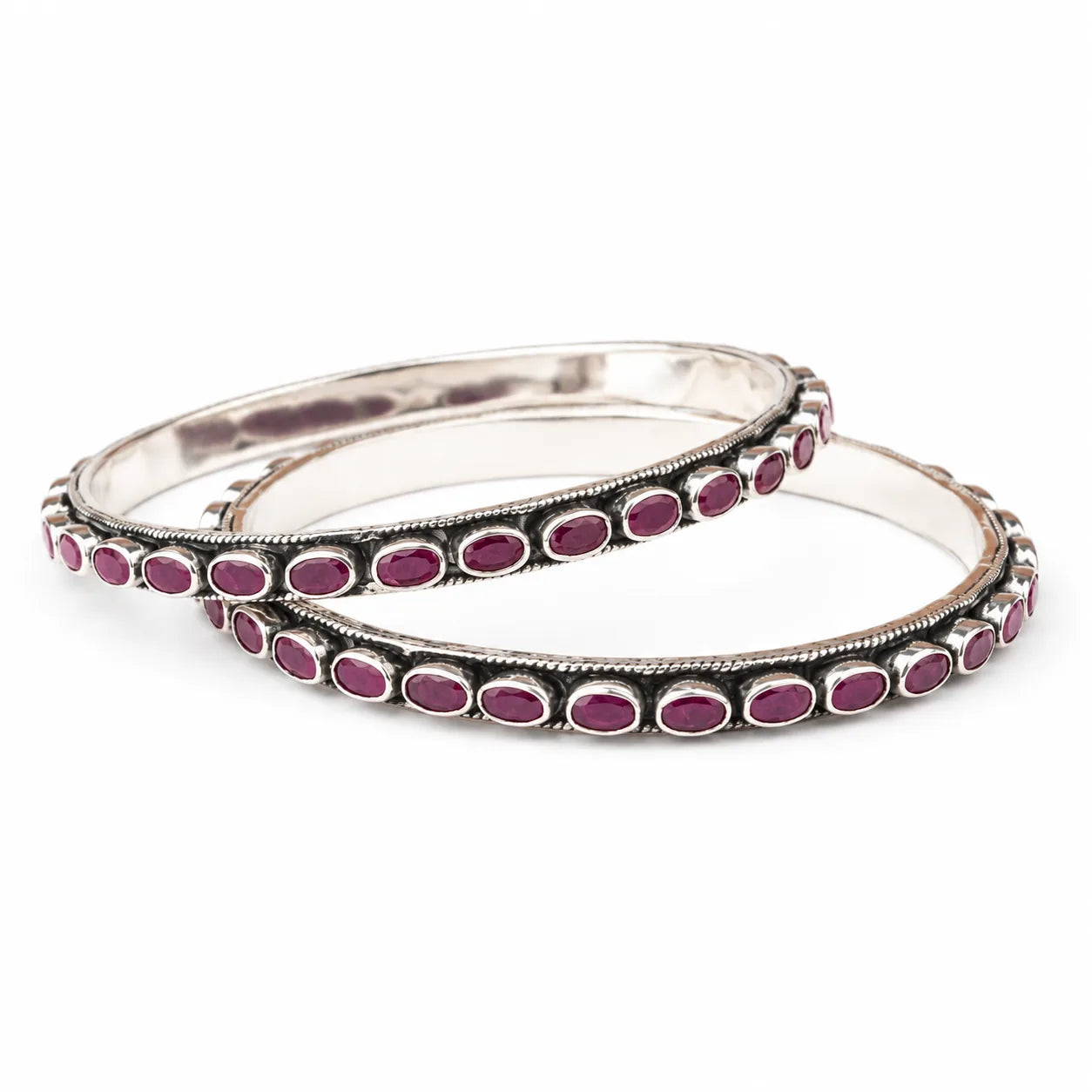 Classic oval silver bangles with red stones