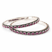 Classic oval silver bangles with red stones