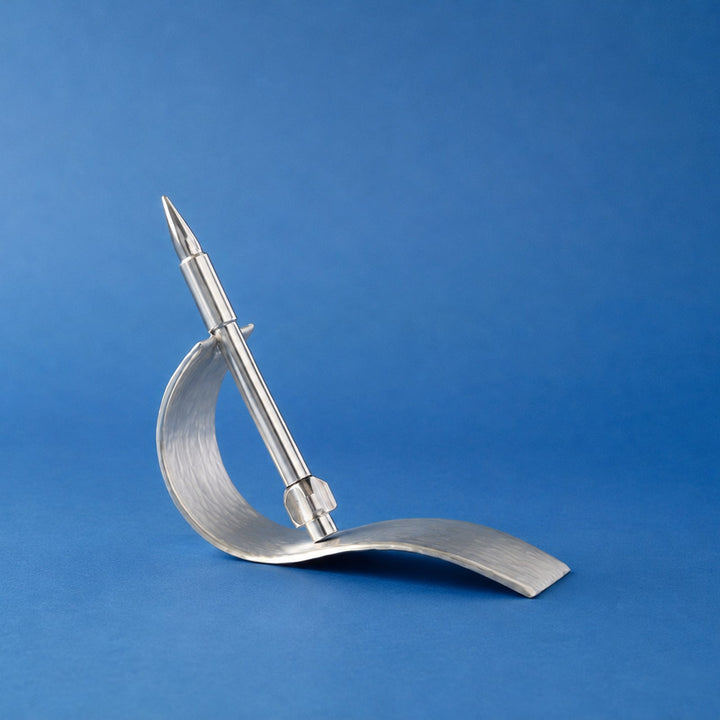 Silver model rocket for a defence company