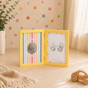 First Impressions Two Fold frame with personalised silver coin and baby handprint by Adorn Silver, image 1