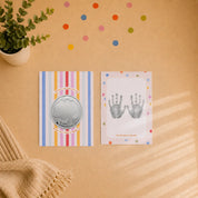 First Impressions Two Fold frame with personalised silver coin and baby handprint by Adorn Silver, image 4