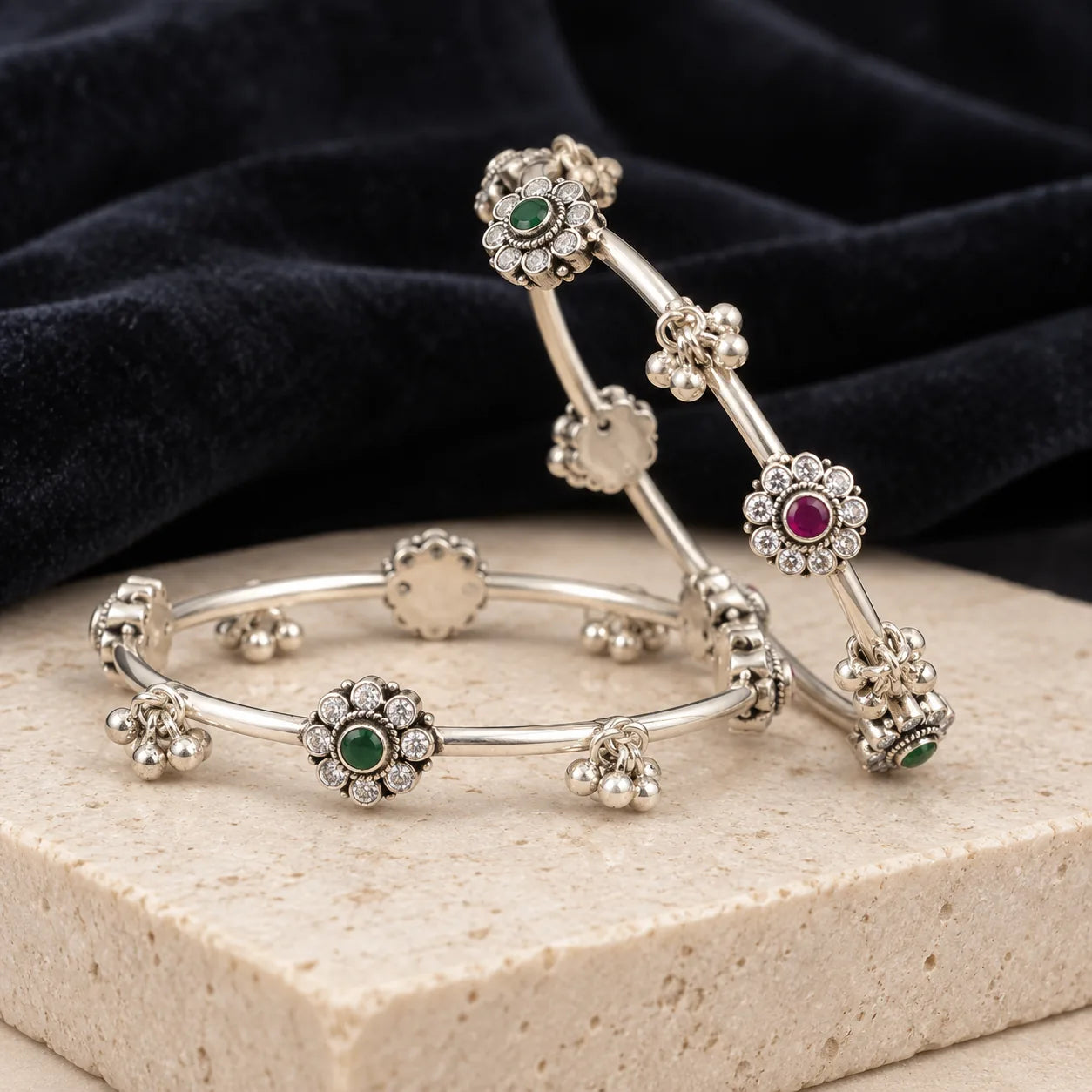 Floral motif dual stone silver bangles, styled