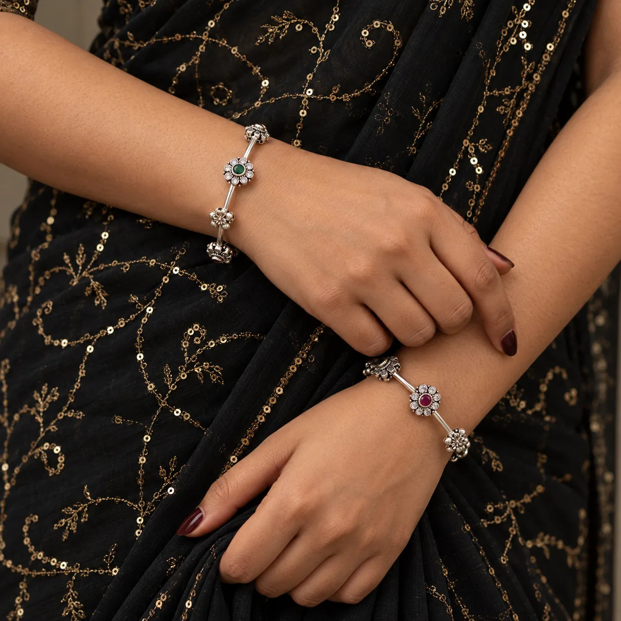 Floral motif silver bangles, detail