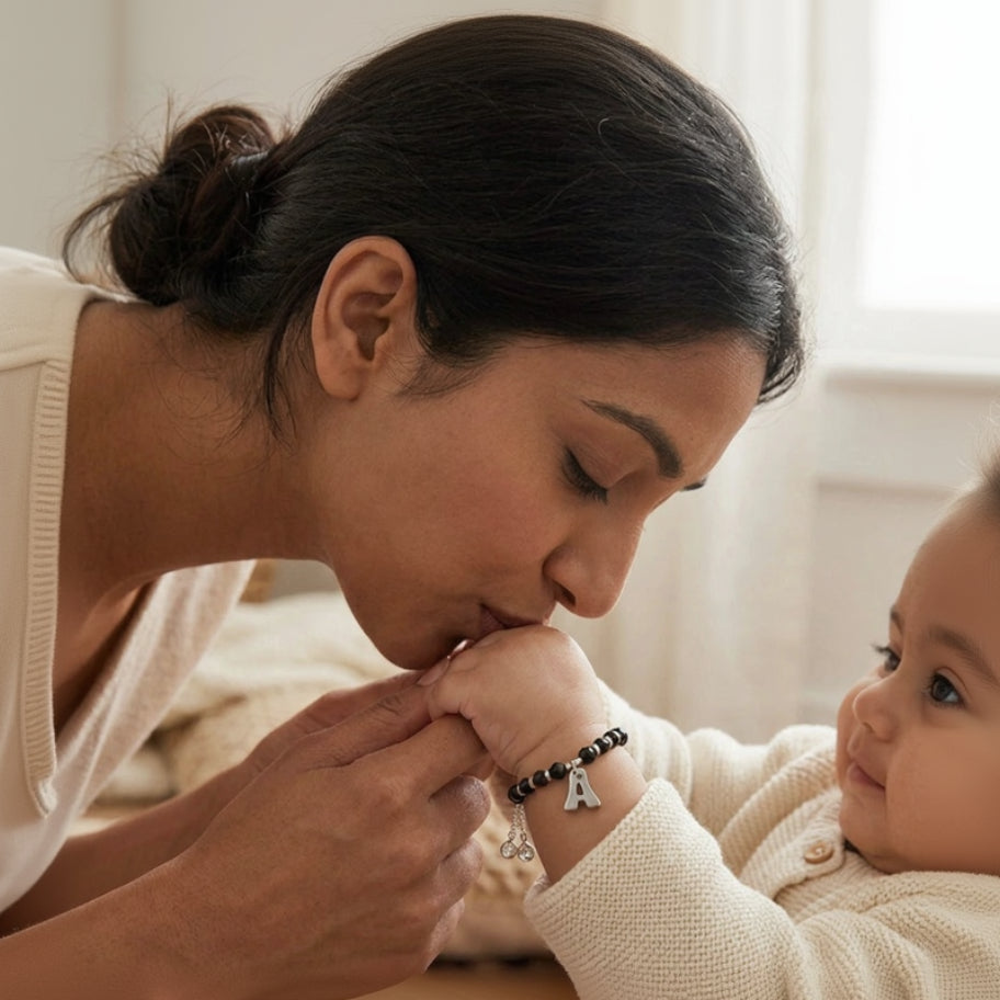 Woman and child interacting closely, with a focus on their hands and faces.