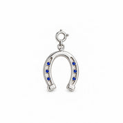 Lucky Step horseshoe charm in 92.5 silver set with blue stones