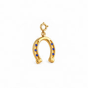 Lucky Step horseshoe charm in gold finish 92.5 silver set with blue stones