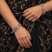 Multi-row silver bangle, styled
