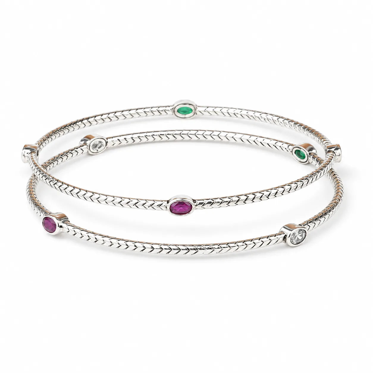 Multi stone silver bangles worn on the wrist