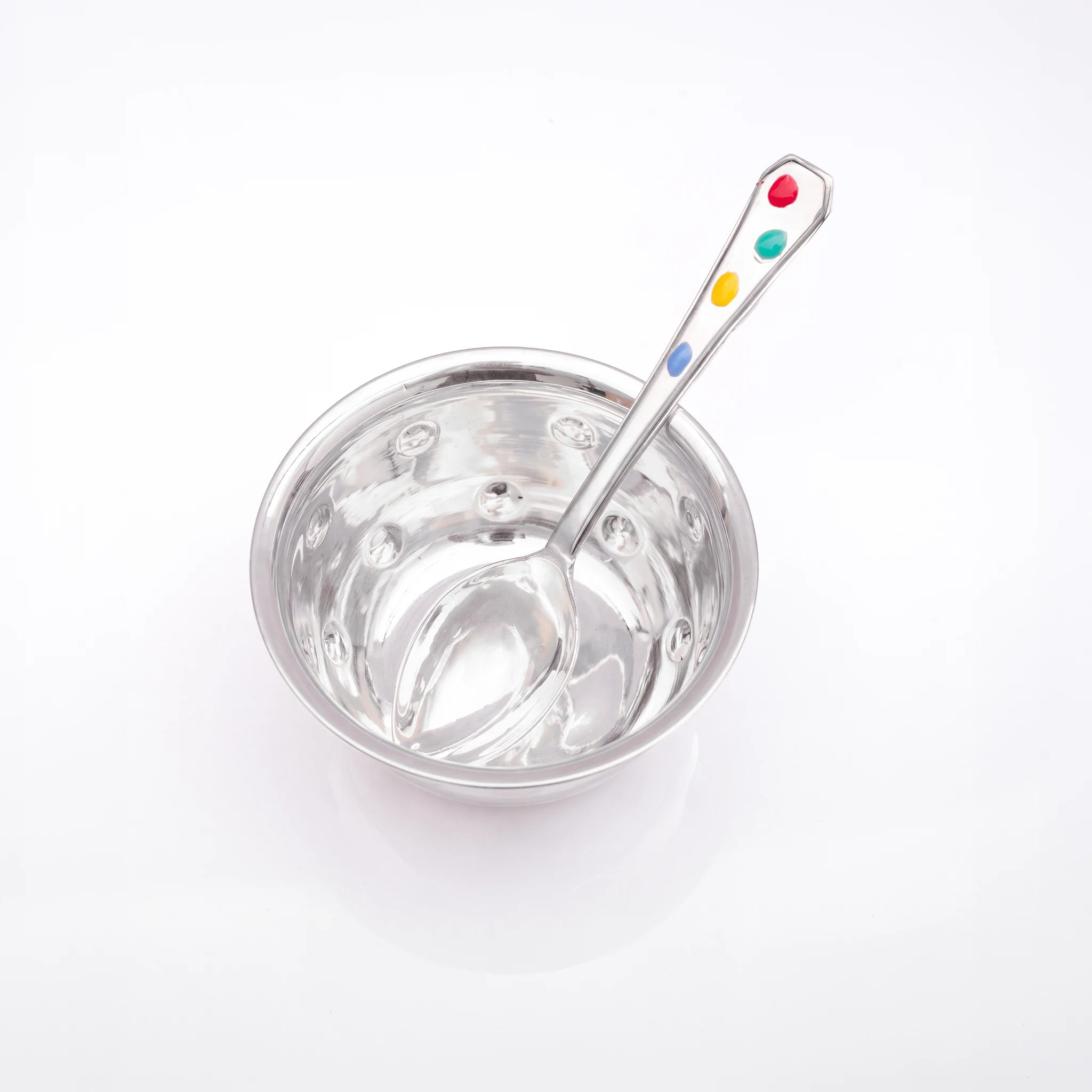 Top view of the My First Silver bowl and spoon by Adorn Silver