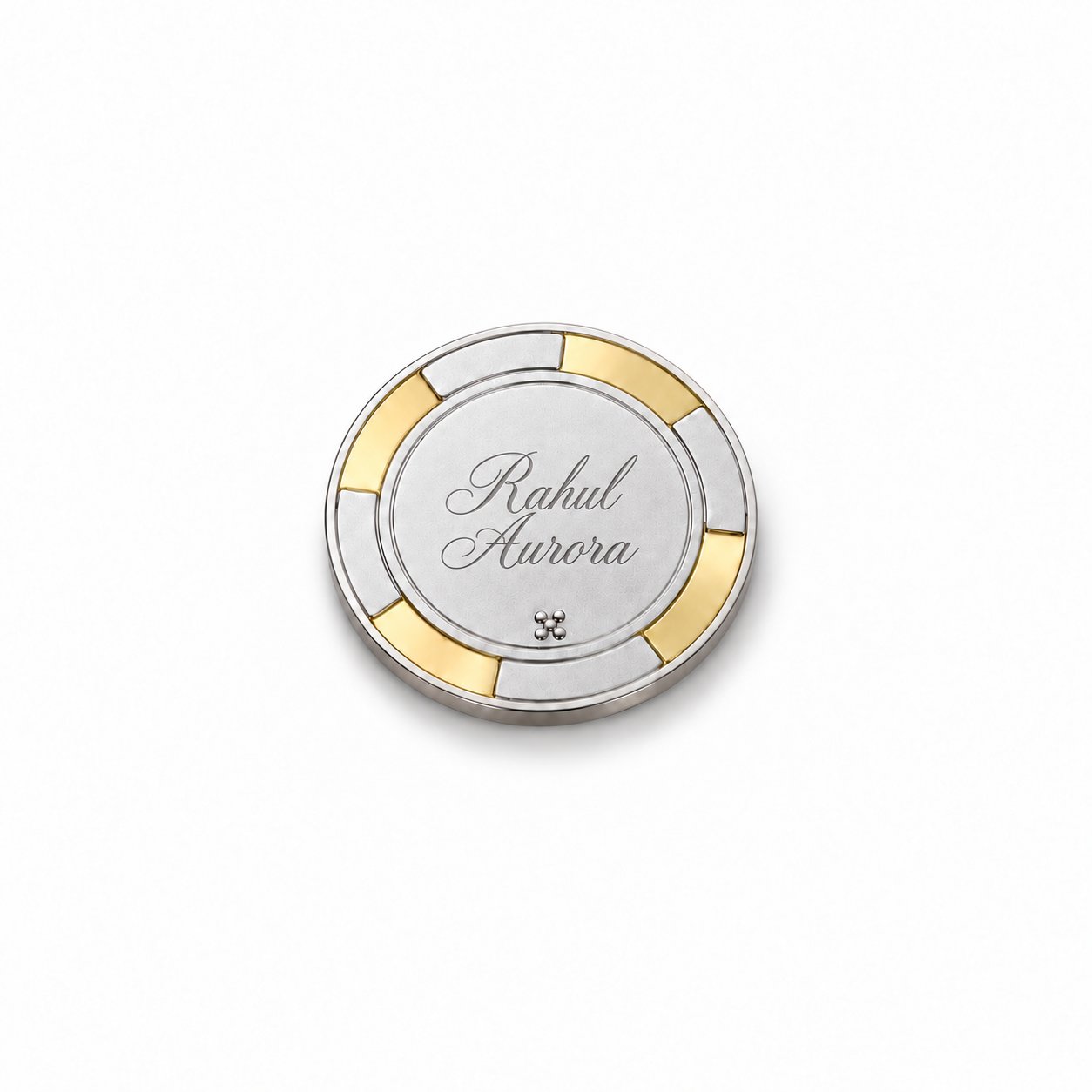 Back of the silver poker chip engraved with a name