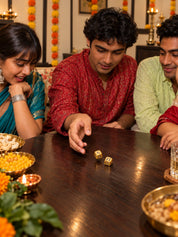 Gold finish silver dice rolled on the table at a Diwali card night